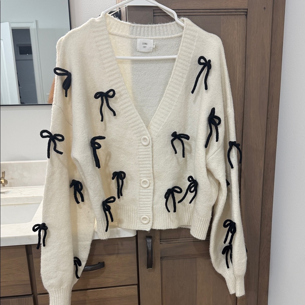 Luna Ivy Cream Cardigan with Black Bow Details